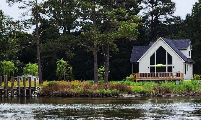 Marion Station House | Secluded waterfront getaway with hot tub,fire pit, and private dock.