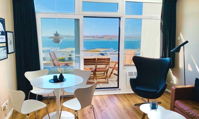 Fehmarn Apartment | See the sea, hear the sea! With sea view balcony directly on Fehmarn's south beach