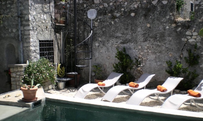 Sermoneta Villa | Sermoneta, Historic Stone Village House with Pool, in a Medieval Hill Town Close to Rome and Naples