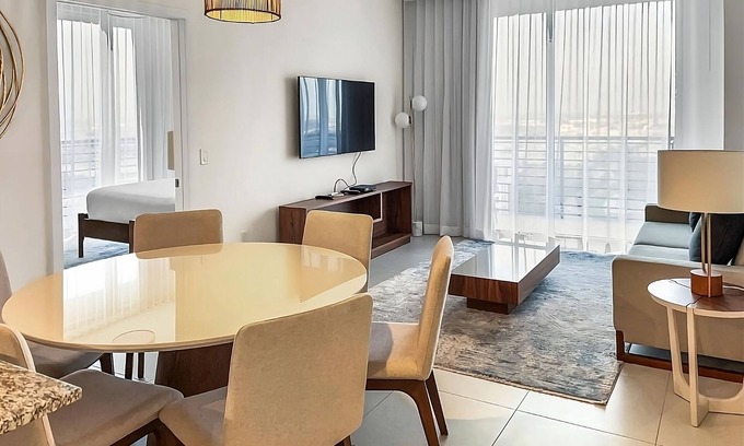Doral Hotel | Short Distance From The Well Known Sites! Onsite Parking, Pool, Pets Allowed