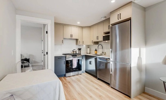 Southwest Calgary House | Sleek Modern 1 BD Suite In Brand New Development!
