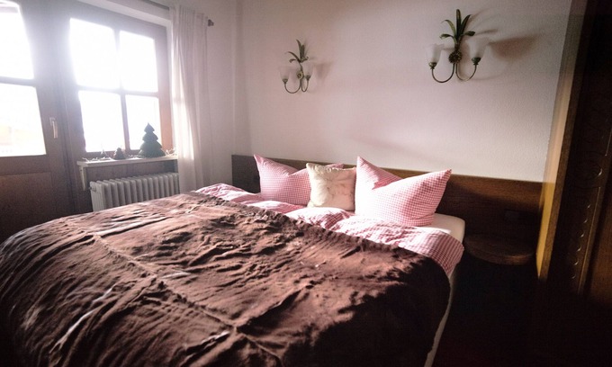 Entfelden Apartment | Small attic apartment with south-facing balcony and mountain view