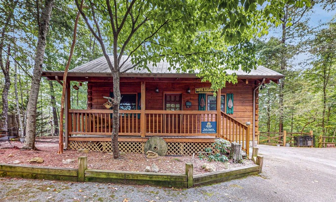 Caton Cabin | Smoky Mountain retreat with deck, hot tub, pool table, & free attraction tickets