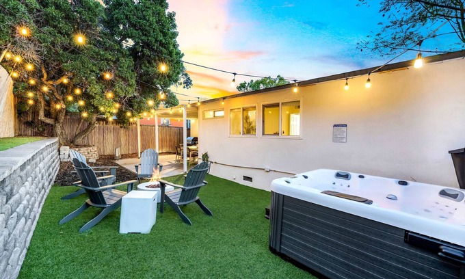 College West House | Spacious 4BR Retreat w/Hot Tub, Fire Pit & Patio