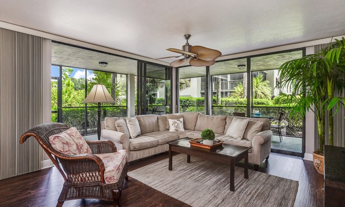 Bonita Bay Condo | Spacious, air-conditioned condo with private W/D, beach shuttle, & central AC