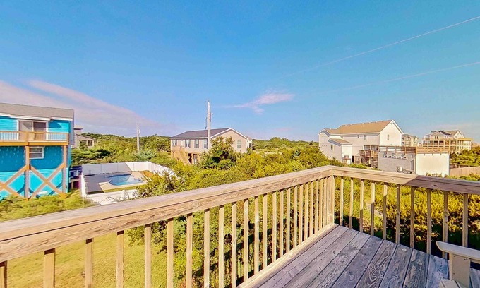 Ocean Isle Estates House | Spacious Avon home with Shared pool, balcony & modern comforts near the beach