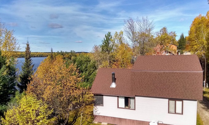 Ely Cabin | Spacious Group Cabin Overlooking Moose Lake with Vaulted Ceilings, Loft & Porch