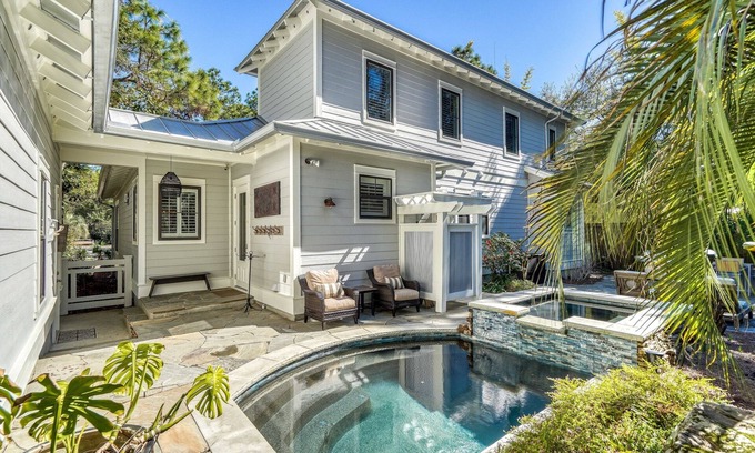 Sugarwood Beach House | Spacious Layout with Heated Pool, Fire Pit, Golf Cart, Bikes, and Carriage House
