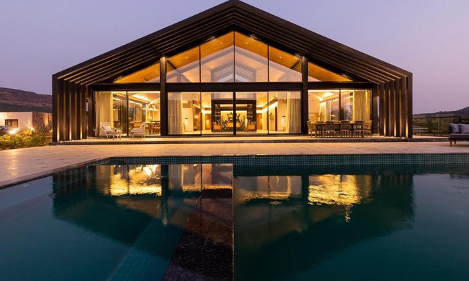 Lonavala Villa | StayVista's The Barn - Mountain-View Luxury Mansion with Heated Infinity Pool, Deck, Jacuzzi, Lawn featuring a Gazebo and Firepit