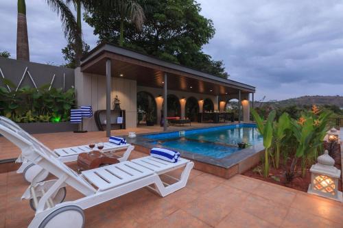 Kune N.m. Villa | StayVista's The Cincin with Elegant Rooms, Snooker Table, Pool, Scenic View