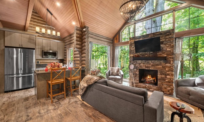 Logan Cabin | Steel Mill-Romanic-Luxurious-Massage Chair-Sauna-Hot Tub-Kayaks-FireTable-Kg Bed