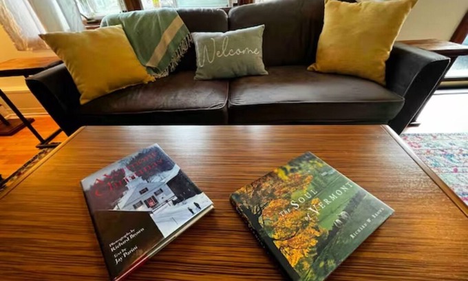 South Burlington House | Step into a world where midcentury modern charm embraces Vermont's beauty!