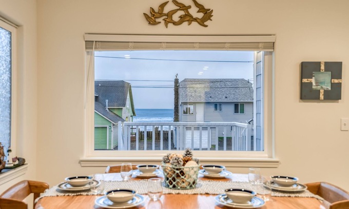 Nelscott House | Steps to the beach, ocean view, deck, BBQ, pet friendly with a fenced in yard