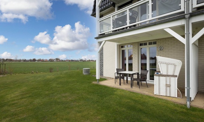 Wremen Apartment | Strandnahe, Familienfreundliche Ferienwohnung mit Sauna, Terrasse und Strandkorb