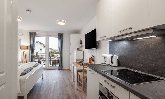 Neustadt in Holstein Apartment | Studio apartment with large balcony and stylish furnishings near the harbor.