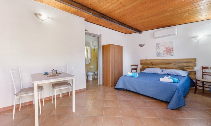 Teulada Apartment | Studio 'Il Mandarino' with Mountain View, Private Terrace and Air Conditioning