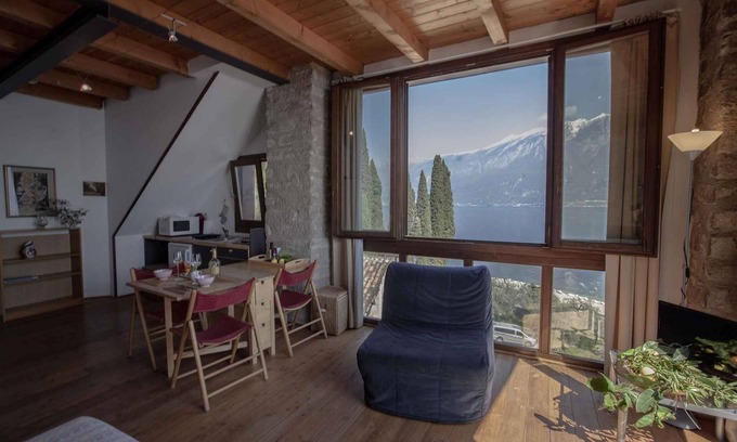 Tignale Apartment | Studio rustically furnished, overlooking lake and with terrace