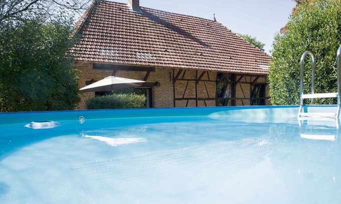La Chapelle-Saint-Sauveur Villa | Stunning private villa for 8 guests with private pool, WIFI, TV, terrace, pets allowed and parking