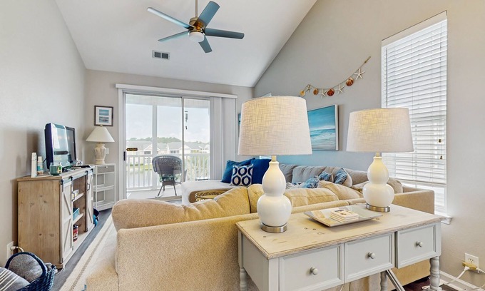 Sunset Beach Apartment | Stunning coastal condo with shared pool, close to beach and local attractions