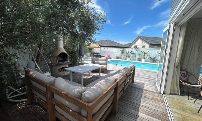 Papamoa Beach House | Stunning Family Home with Pool, Spa & Walk to Beach in Papamoa