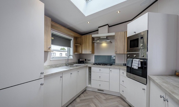 Blackford Ski Chalet | Stunning lodge with one double with en-suite shower and two twin.