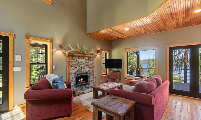 Coeur d'Alene House | Stunning mountain escape with lake views, expansive furnished deck & firepit - dog-friendly