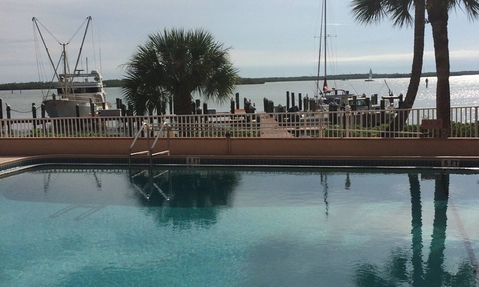 Marco Island Condo | STUNNING VIEWS!.1 Bed and 1 bath, sleeps 4 with Wifi in unit.