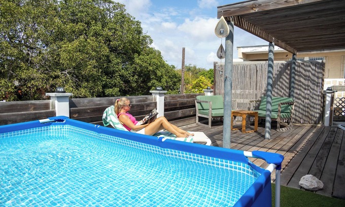 Nieuw Nederland Apartment | Stylish apartment with private rooftop pool in Pietermaai