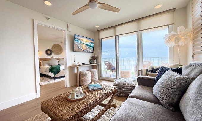 New Smyrna Beach Condo | Stylish Oceanfront Corner Condo Steps to Beach & Flagler Ave Fun