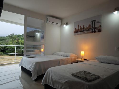 Villeta House | Suite Privada, Aire Acondicionado, Balcon y Piscina