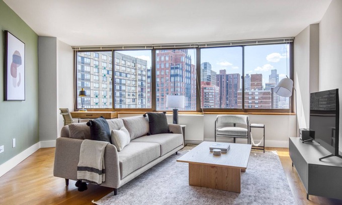 Upper East Side Apartment | Sunlit UES 2BR w/DM, Elevator & Gym, nr Central Park, by Blueground