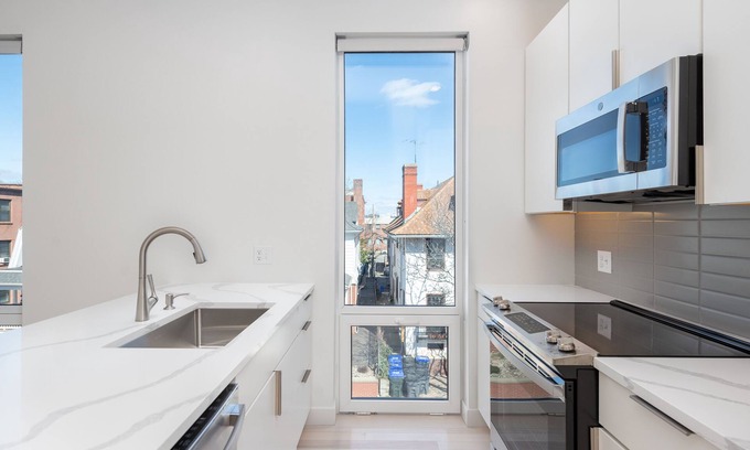Wayland Apartment | Sunny 2-Bedroom Cityscape located in Highly Regarded East Side Square