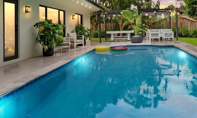 Ludlam House | Sunset in Miami w/heated pool & lake view