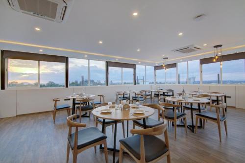 RR Nagar Hotel | Super Townhouse Global Village Tech Park Near Kengeri Bus Terminal Metro Station