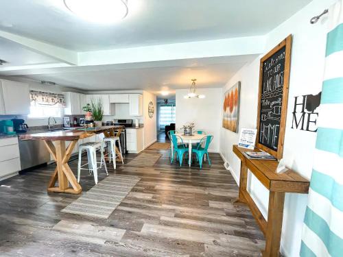 Huron House | Surf Cottage - Boat Parking & Block from Beach