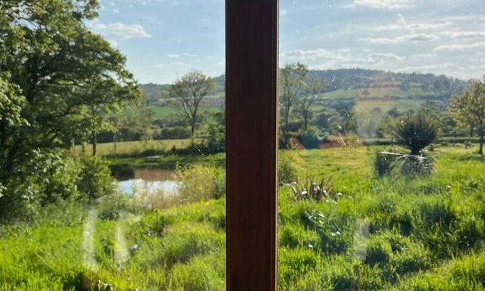 Bridport Cabin | Swimming lake coast close cosy self contained hobbit house amazing walks &views,