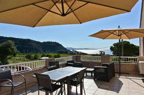 Farinole Apartment | Terrasse panoramique ensoleillée avec vue mer