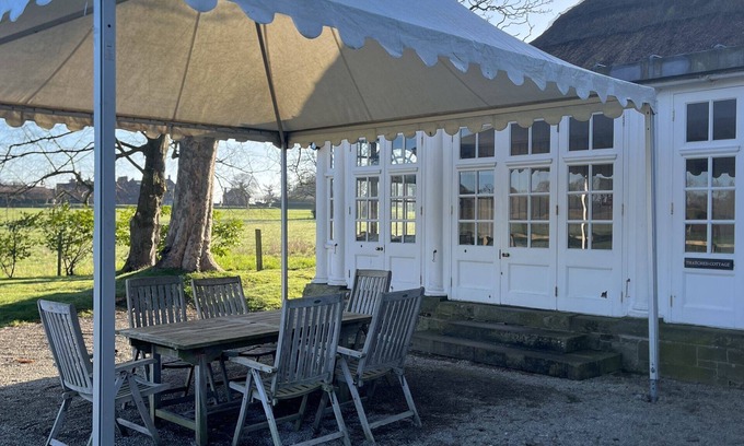 Thornton Hough Cottage | Thatched Pavilion including Hot Tub