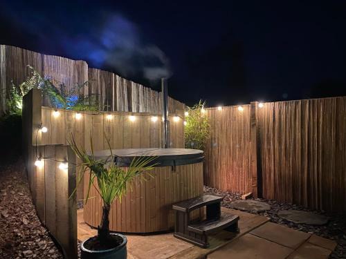 Monksilver House | The Barn at Burfords with wood fired hot tub