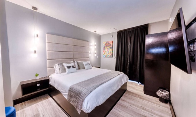 Biloxi Hotel | The Bella's Swing & Sway Suite, Sleeps 2, King Bed, Private Patio