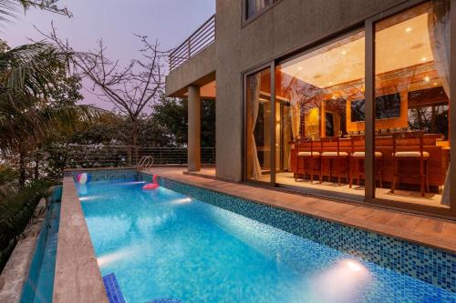 Alibaug Villa | The Blue Horizon by StayVista - Featuring a beach-view villa with a swimming pool, indoor games, and a relaxing balcony