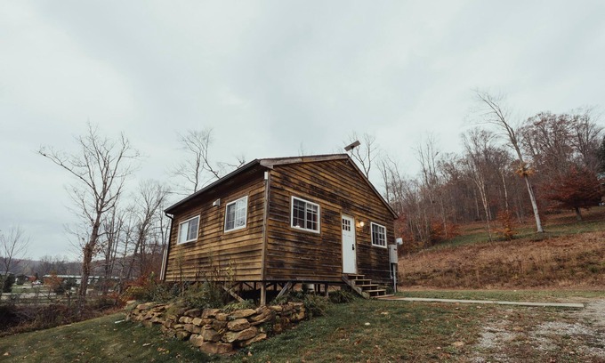 South Bloomingville Cabin | The Hideout - Escape to The Hideout in Hocking Hills, OH! This cozy, pet-friendly cabin offers a private deck by Pine Creek, just minutes from hiking, waterfalls, and caves. Perfect for up to 4 guests. Book your nature-filled getaway today!