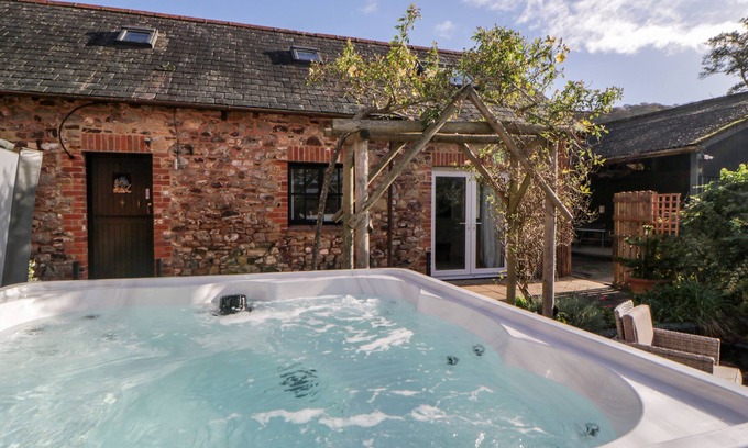 Sidmouth Cottage | THE HOLT, pet friendly, with hot tub in Sidford