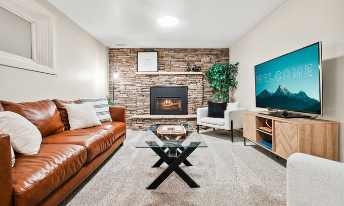 East Colorado Springs Apartment | The Lower Luxe ~ Private Backyard Oasis ~ Hot Tub ~ Fire-Pit ~ Centrally Located