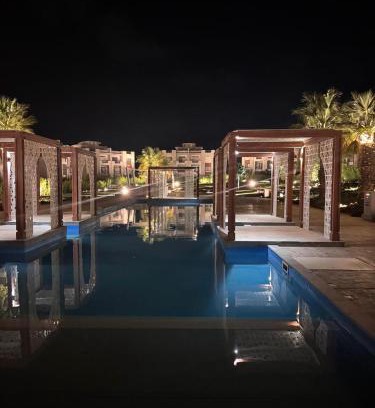 Ad-Dab'ah Apartment | The Pearl Chalet Gaia Resort Ground floor with garden