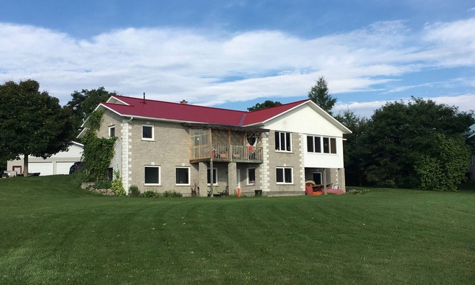 Whitewater Region House | The River House Suite - waterfront walkout