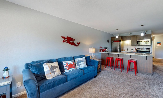 Neskowin Condo | Third-floor beachfront condo with a balcony, full kitchen, & ocean views