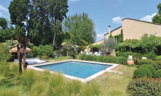 Cabannes Apartment | This apartment is part of a property with a large communal pool, which brings joy to young and old.