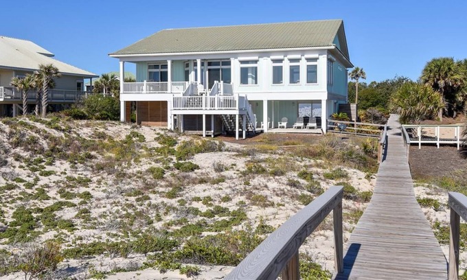 Sea Palm Village House | This beachfront home will truly surprise you with its stunning transformation!