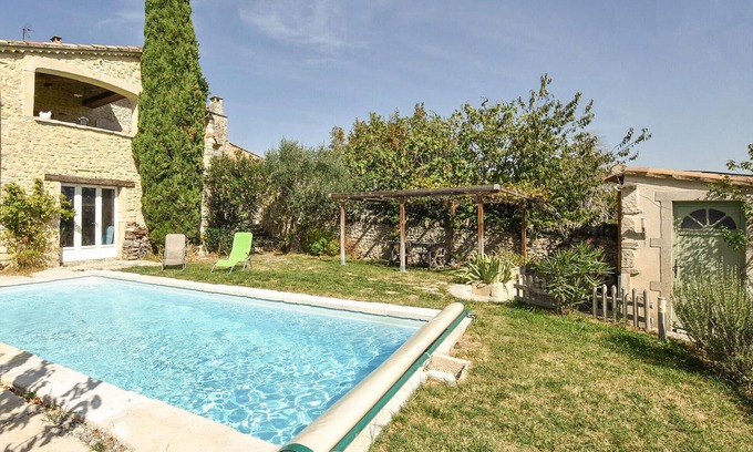 Taulignan House | This beautiful and spacious stone vacation home welcomes you on a large and wooded property.